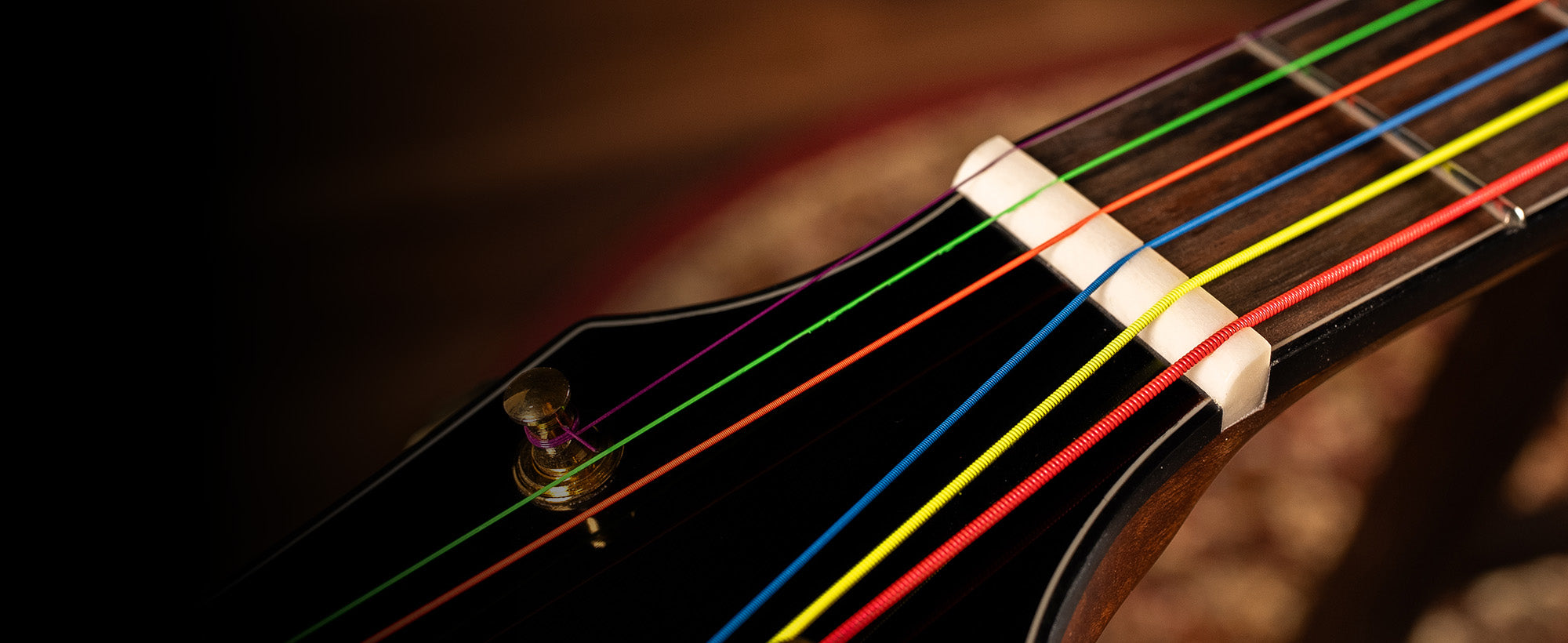 DR-Strings-Neon-Multicolor-Acoustic-Strings-Banner-1